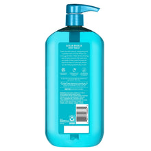 Teal body wash bottle with blue pump, back panel label and barcode