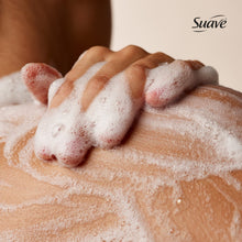 Foamy lather on hands from Suave Strawberry Delight body wash