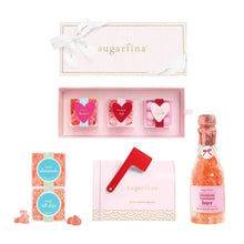Valentine candy bundle with assorted heart candies and strawberry champagne bears bottle