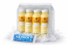 Chilled bottles of organic ginger love cold-pressed juice in a clear ice pack.