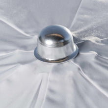 SunVilla umbrella top finial with reflective metal dome on white canopy