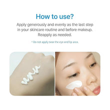 White sunscreen cream on cheek, hand spreading product across skin