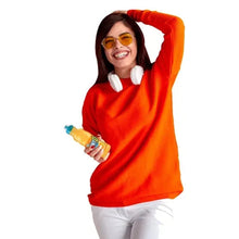 Sunny D Tangy Original bottle held in hand, blue cap and citrus graphics