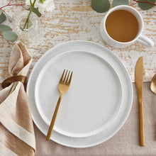 White coupe salad plate with smooth glossy surface