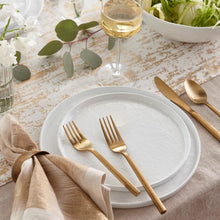 White coupe salad plate with wide rim, top view