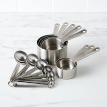 Stainless steel measuring cup set with stackable cups and assorted spoon measures