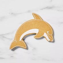 Dolphin cookie cutter, tan outer shape with white outline