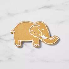 Elephant cookie shape made with cutter, gingerbread-style outline