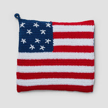 Flag crochet pot holder with red, white, and blue stripes and star pattern