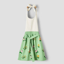 Floral embroidered apron with cream bib, green floral skirt, bow neck tie