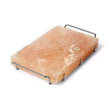Himalayan salt block with metal carrying handles, light pink stone slab
