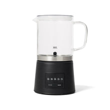 Electric hot chocolate maker with milk frother, clear pitcher and black base