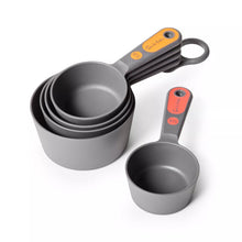 Set of 5 gray measuring cups with stacked nesting cups and two handle loops