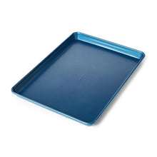 Sapphire blue half sheet nonstick pan with rolled rim and smooth interior