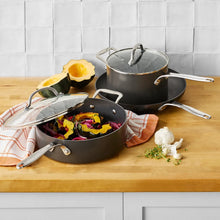 Nonstick sauté pan with lid, dark nonstick interior, long handle