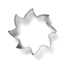 Sun cookie cutter, metal outline in gray with scalloped edges
