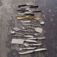 Set of twig demitasse spoons in silver and gold tones