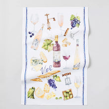 Wine kitchen towel with illustrated bottles, grapes, and glasses; blue border, white fabric