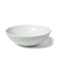 White coupe cereal bowl with a smooth glossy ceramic finish