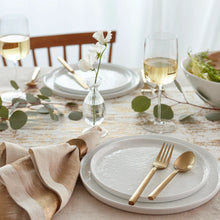 White coupe salad plate with place setting visible