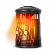 Black space heater with warm heat glow visible through the front grille