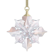 Star-shaped Swarovski ornament with faceted clear and pink crystals, gold hanging loop