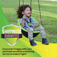 Green toddler swing outdoors with child holding straps, harness fastened
