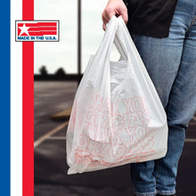 White t-shirt carry-out bag held by shopper, red THANK YOU GRACIAS print