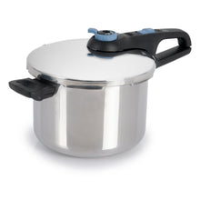 Stainless steel pressure cooker with domed lid and blue safety valve