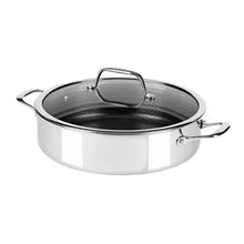 Stainless steel universal pan with glass lid and black speckled interior
