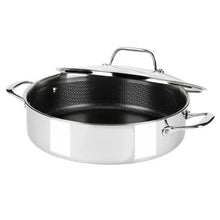 Stainless steel pot with black interior, glass lid, and side handles