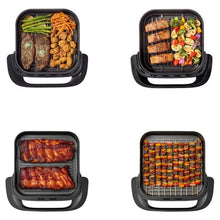 Black infrared air fryer with basket open for different cooked food portions