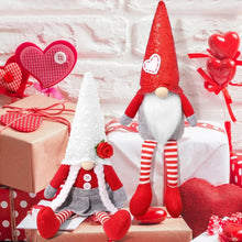 Valentine tomte plush pair with cone hats, heart graphics, striped leggings, and rose flowers