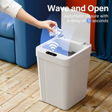 Touchless smart trash can, white plastic bin with raised lid triggered by hand