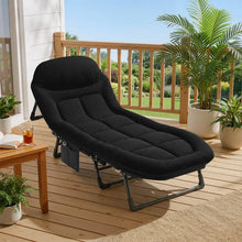 Folding camping cot with padded cushion and rounded headrest, black fabric and steel frame