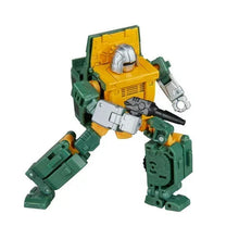 Green and yellow Autobot Brawn-style action figure with silver face and black rifle