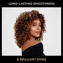 Curly hair with long-lasting smoothness and brilliant shine text overlay