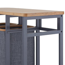 Laundry station side view with bamboo tabletop and gray fabric bins behind open frame
