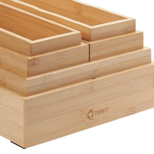Bamboo drawer organizer with stacked dividers and TRINITY logo