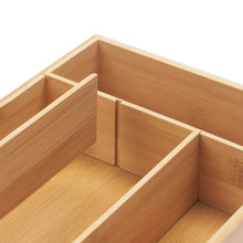 Bamboo drawer organizer divider grid showing separate compartment walls