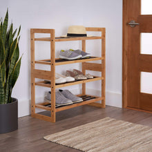 Bamboo shoe rack with three shelves and dark slat surface for shoes and boots