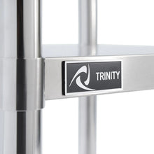 Stainless steel table crossbar with TRINITY logo label on lower shelf frame