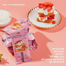 TRUBAR Strawberry Shorty Got Cake protein bar pouch with slice and toppings.