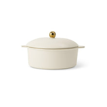 Cream ceramic casserole dish with lid and gold-tone knob