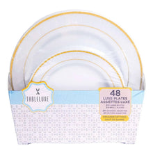 Round white disposable plastic plates with gold rim, stacked in 48-count pack
