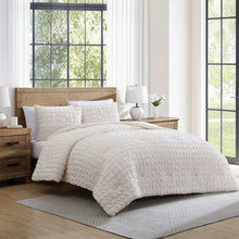 Cotton comforter set featuring a white quilted comforter and matching pillow shams