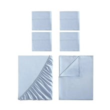 Blue microfiber sheet set pieces: flat sheet, fitted sheet, and pillowcases shown