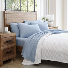 Microfiber sheet set in blue, with matching pillowcases and flat sheet for a bed