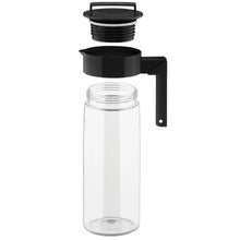 Clear beverage pitcher with black lid and handle
