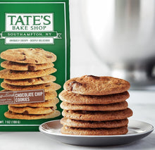 Stack of thin chocolate chip cookies next to Tate's Bake Shop package